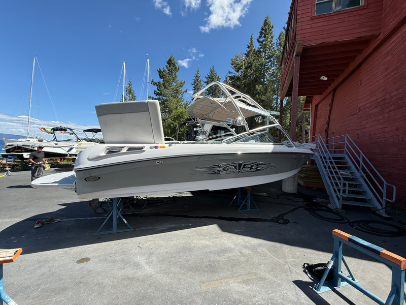 Side profile of 2007 Air Nautique 236 TE on stands at Obexer’s Marina
