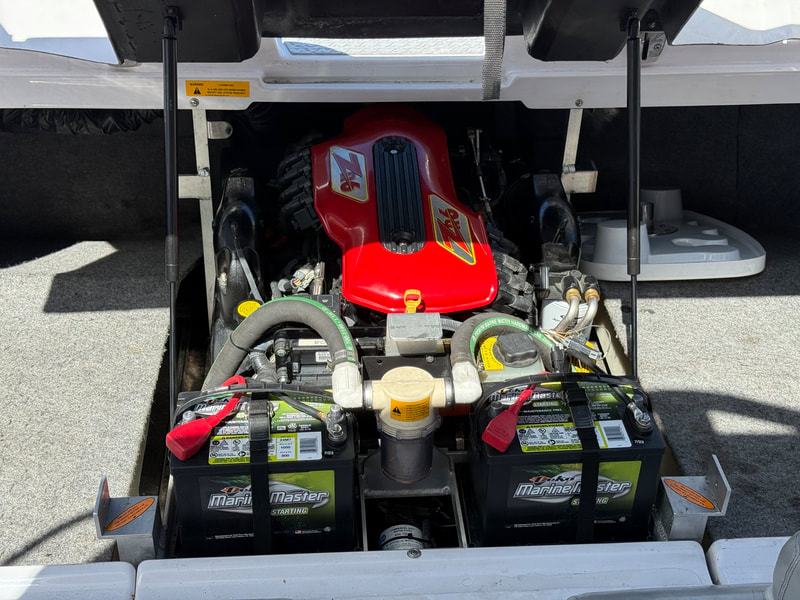 Open engine bay of Air Nautique with ZR6 PCM motor and twin batteries