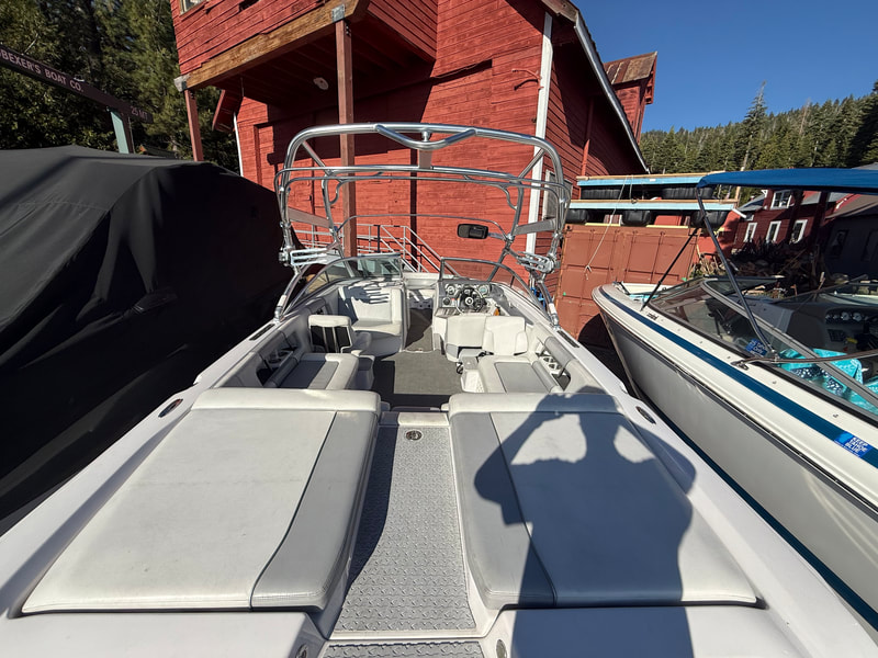 Aft sunpad and swim platform entry area on Air Nautique 236 TE